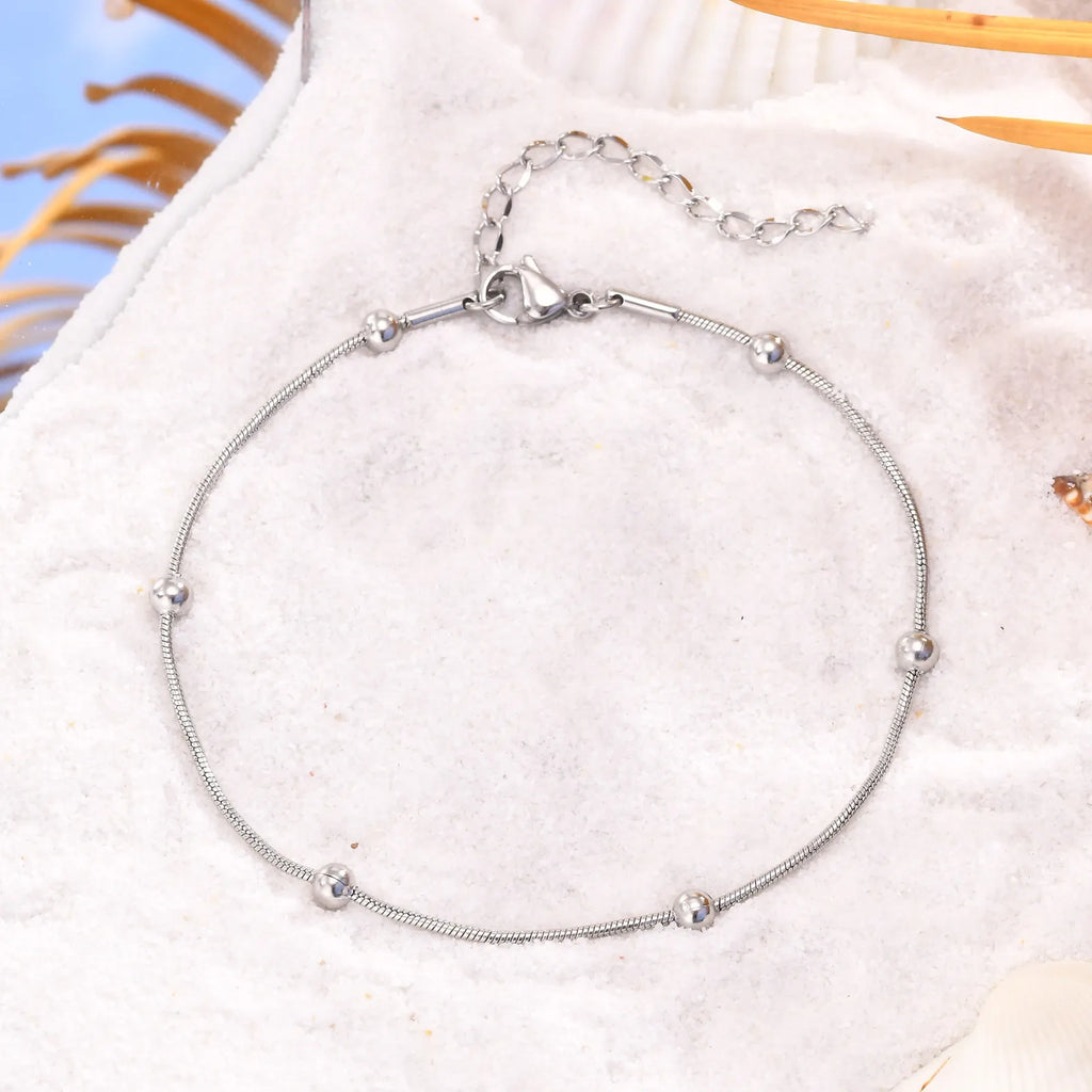 Bracelet de Cheville Signature – Élégance Minimaliste pour Elle & Lui