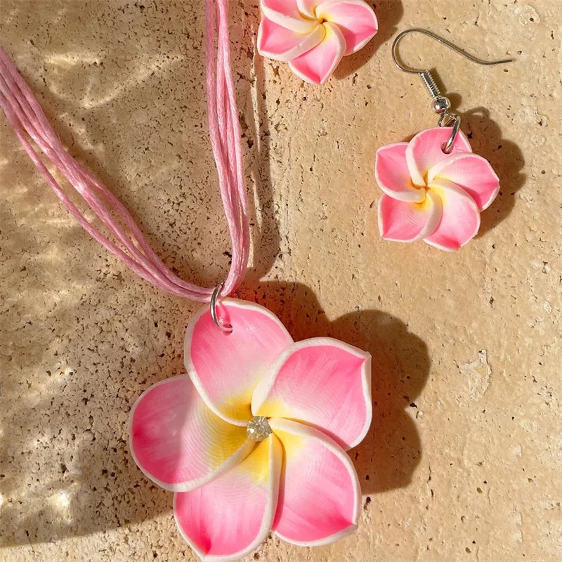 Ensemble collier et boucles d'oreilles fleur