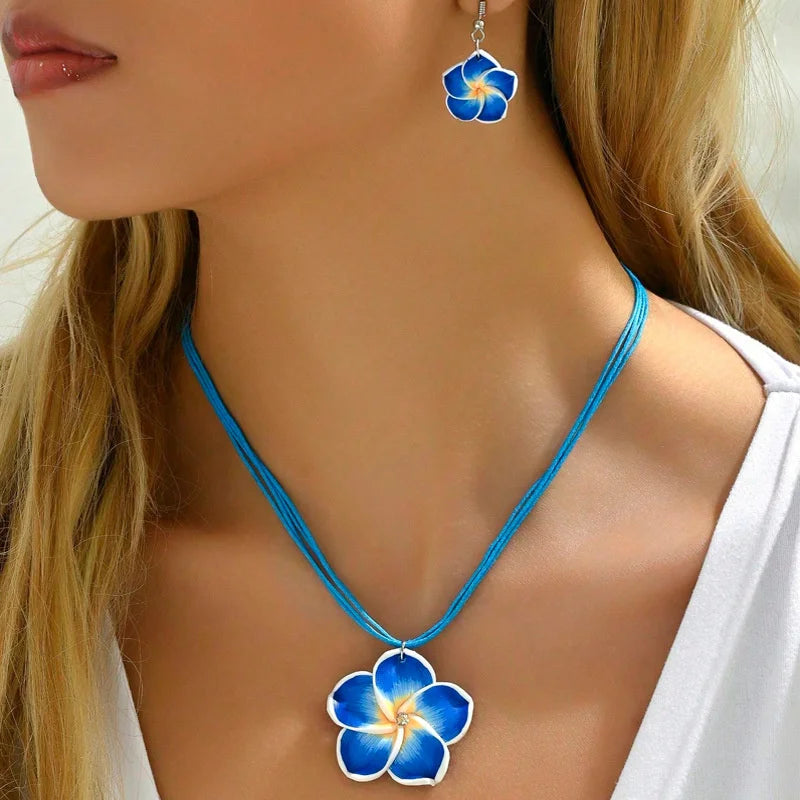 Ensemble collier et boucles d'oreilles fleur