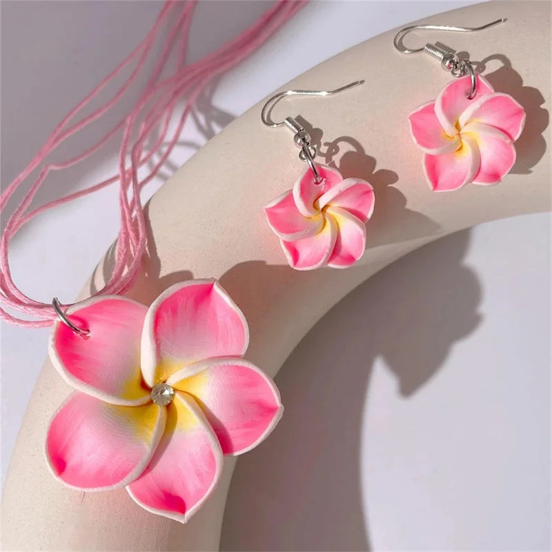 Ensemble collier et boucles d'oreilles fleur