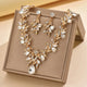 Parure de bijoux classique femme : Collier et boucles d'oreilles